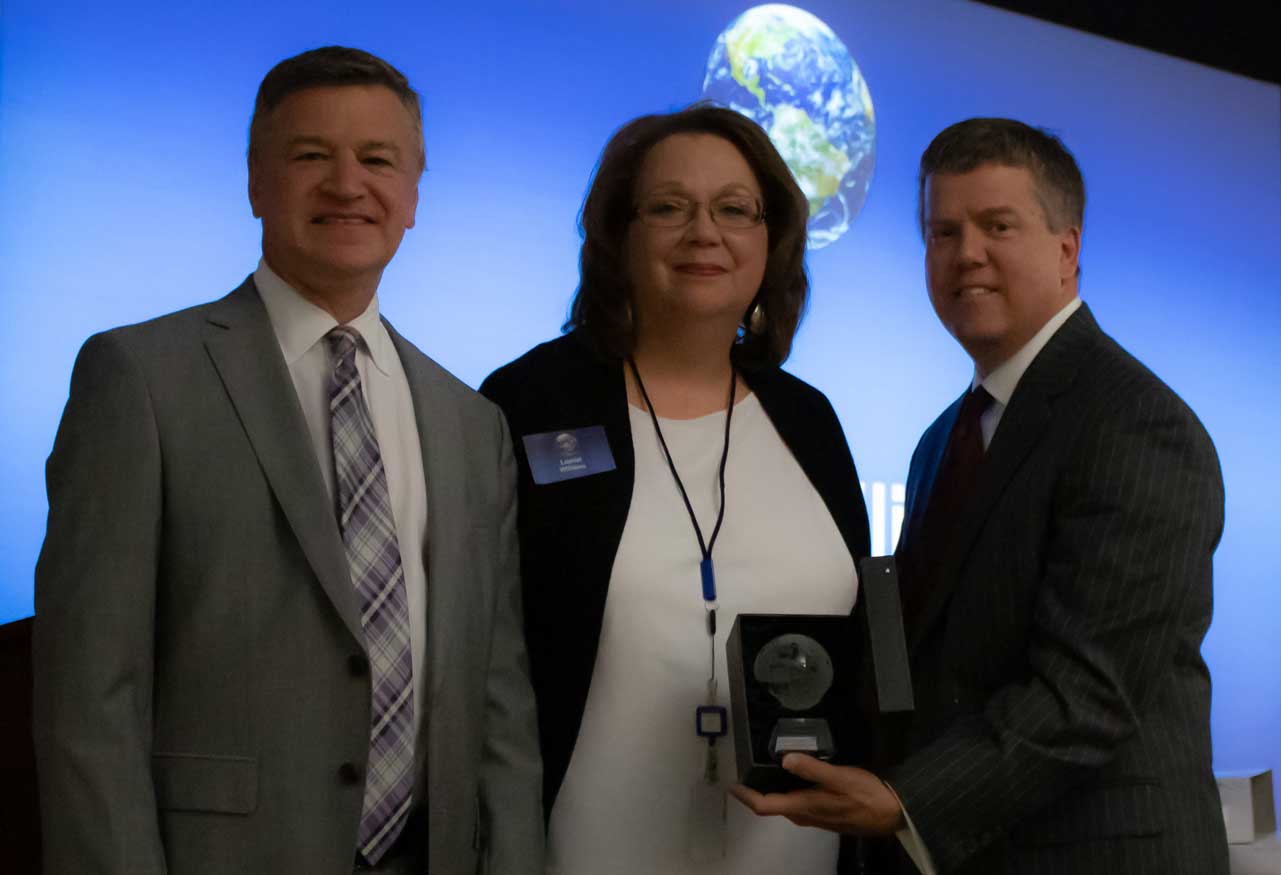 Photo of business professionals at award ceremony Photo of business professionals at award ceremony